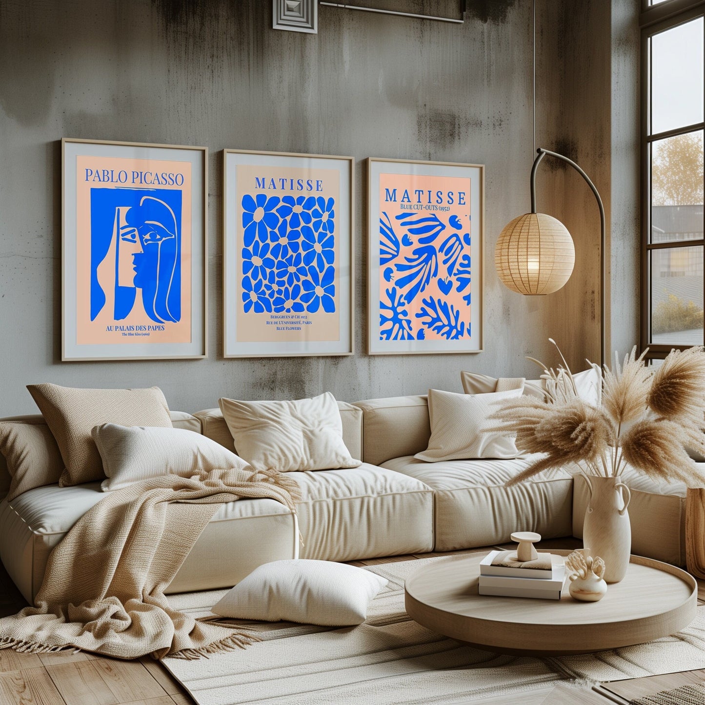 A masterful triptych featuring Picasso&#39;s famed portrait and Matisse&#39;s blue cutouts, harmoniously uniting in a modern living space.