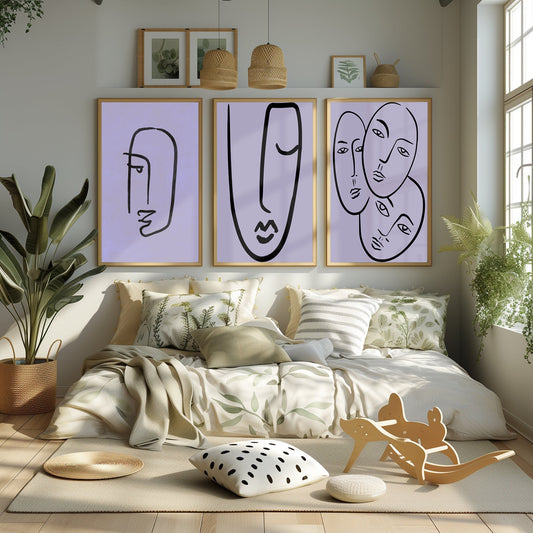 A trio of reflective line art pieces, featuring abstract profiles, poised elegantly on a sunny bedroom wall, evoking a sense of calm and thoughtfulness.