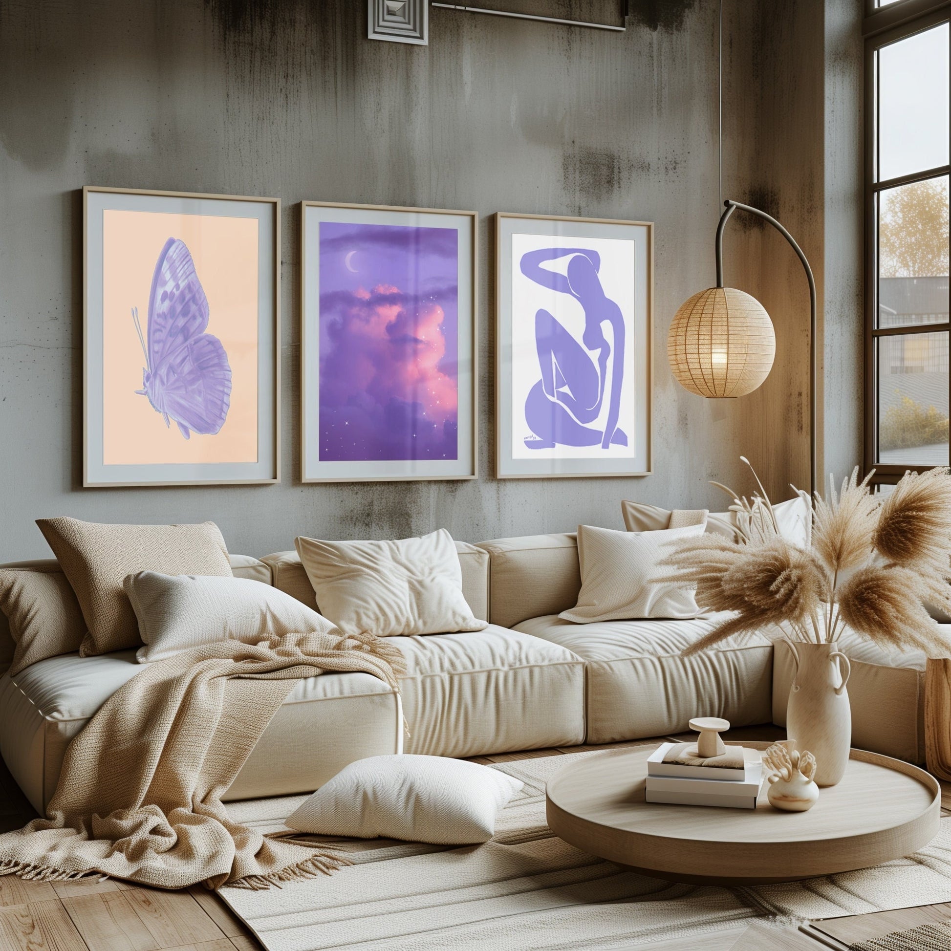 A triptych of purple-themed art with a butterfly, a starry twilight sky, and a silhouette, bringing a dreamlike quality to the living space.