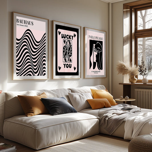 An avant-garde collection of Bauhaus-inspired waves, a whimsical &#39;Lucky You&#39; graphic, and Picasso&#39;s iconic muse, in a contemporary setting.