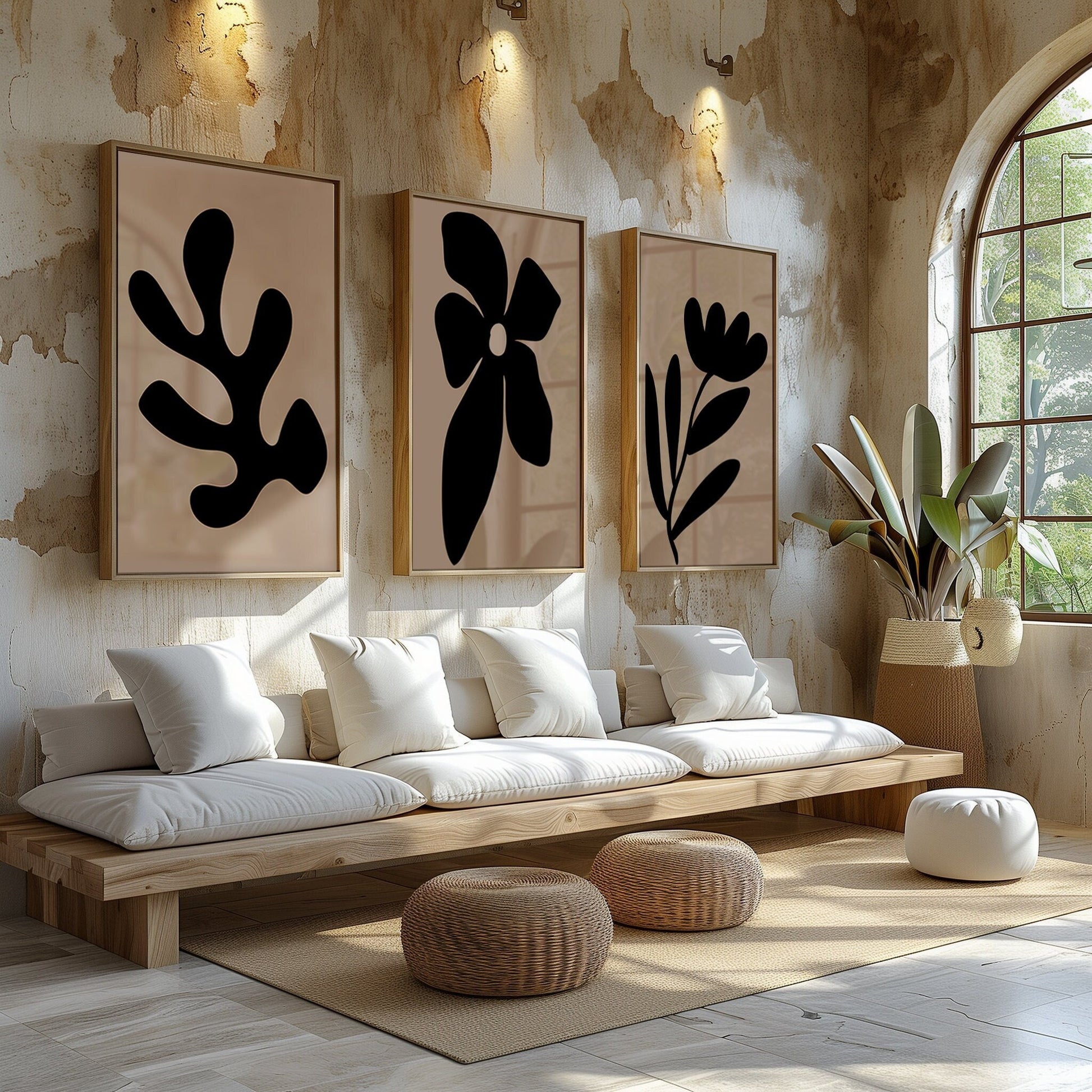 Set of three monochrome botanical silhouette prints, creating a bold statement in black and white for home decor.