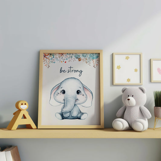 Nursery wall art featuring a cute elephant with the quote &quot;Be Strong,&quot; perfect for kids room and nursery decor. Available as an instant digital download.