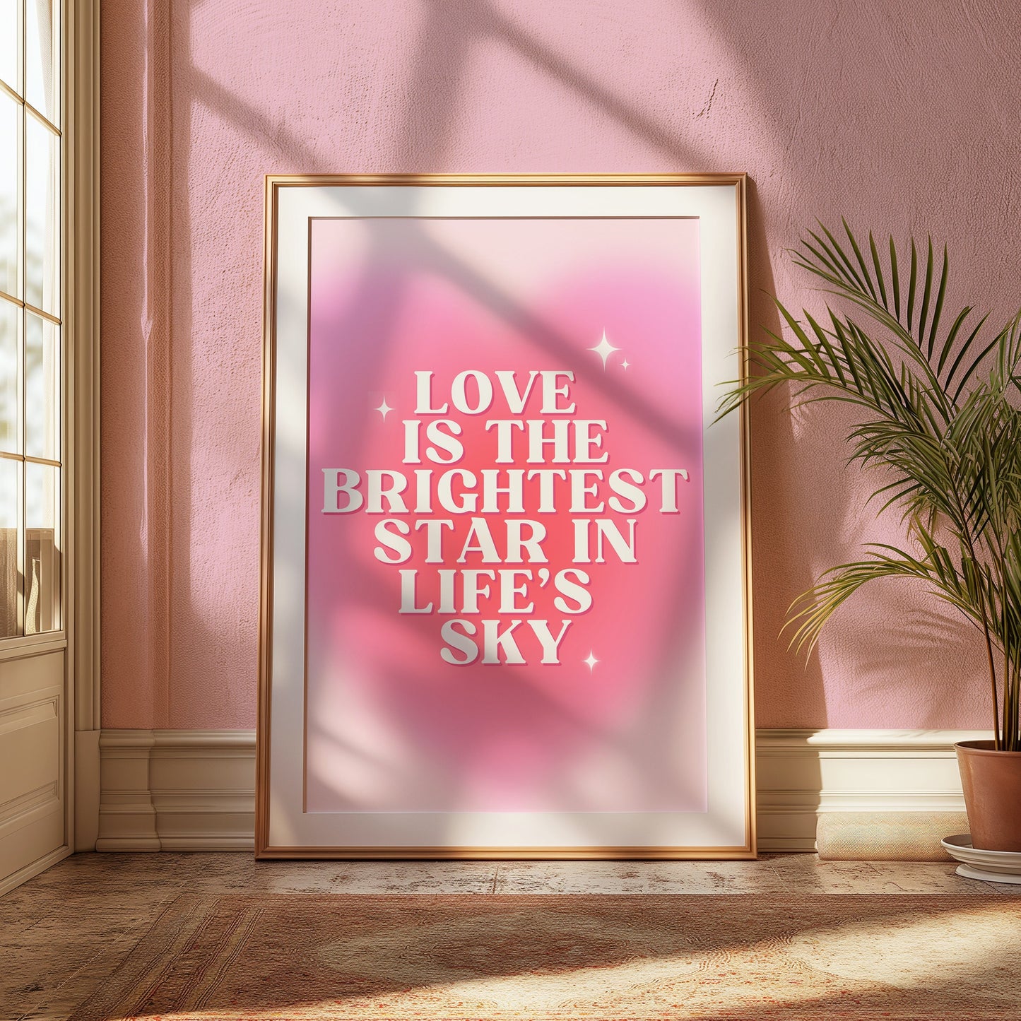 A pink poster with the quote &quot;Love is the Brightest Star in Life&#39;s Sky&quot;, perfect for romantic and inspirational home decor.An inspirational love poster with the quote &quot;Love is the Brightest Star in Life&#39;s Sky&quot; on a pink background.