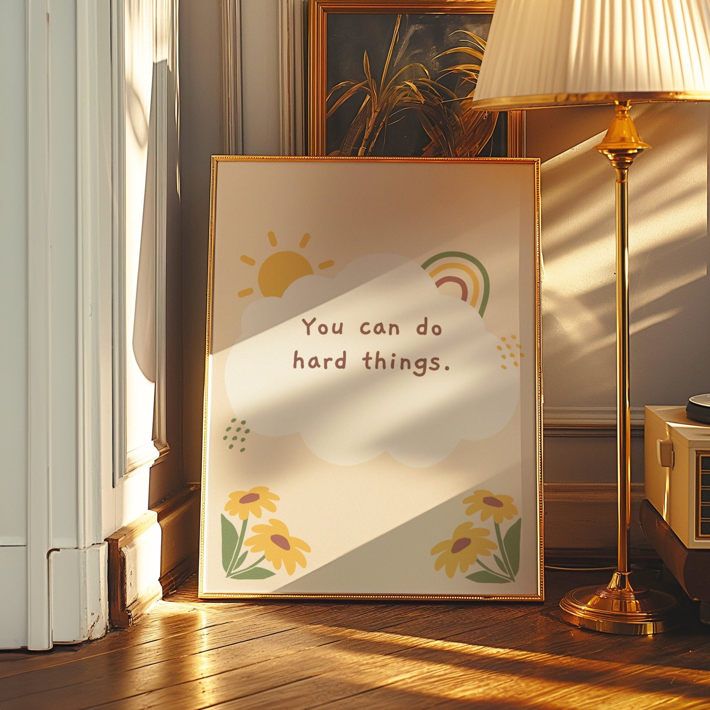 A motivational poster with the phrase &quot;You Can Do Hard Things,&quot; featuring a sun, rainbow, and flower illustrations in a minimalist design.