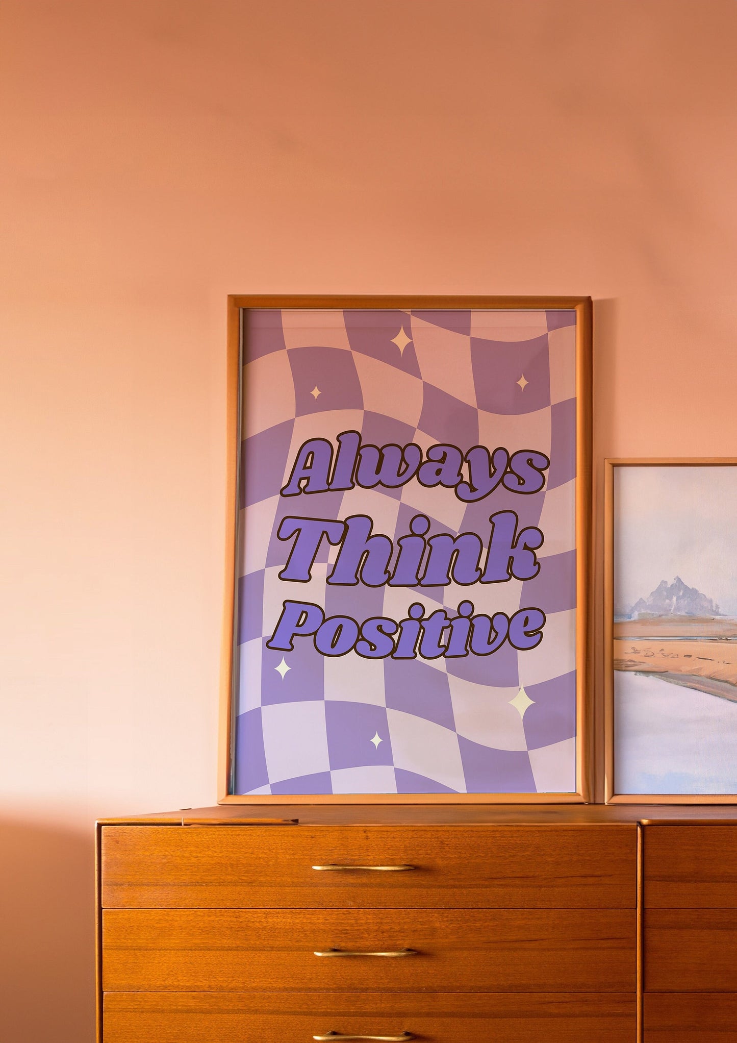A motivational poster with a wavy checkered background in purple and white, featuring the phrase "Always Think Positive" in bold, uplifting text.