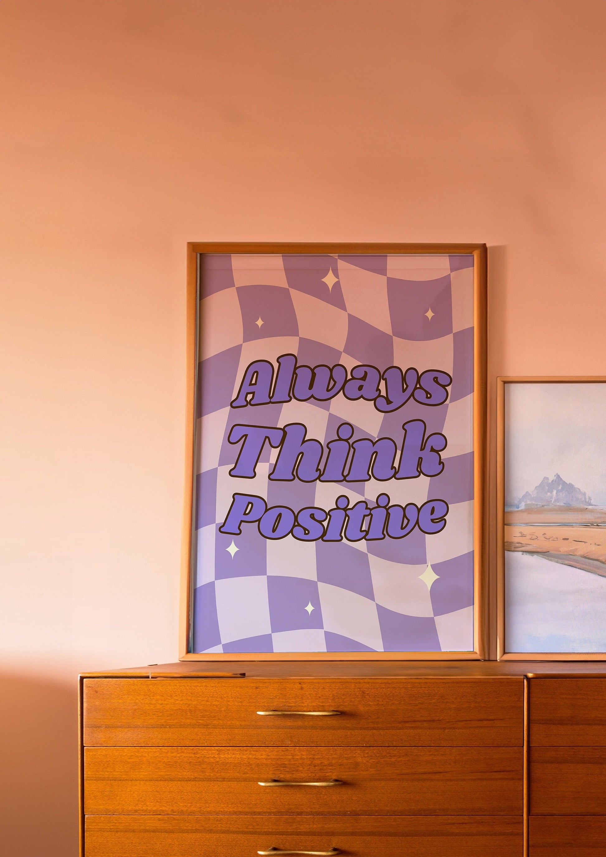 A motivational poster with a wavy checkered background in purple and white, featuring the phrase "Always Think Positive" in bold, uplifting text.