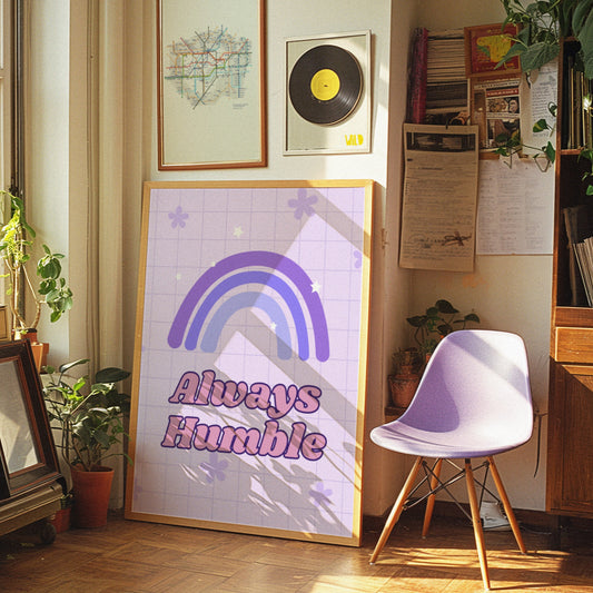 Retro poster with a purple rainbow and the text &quot;Always Humble&quot; in bold letters, set against a light purple background with stars and flowers.