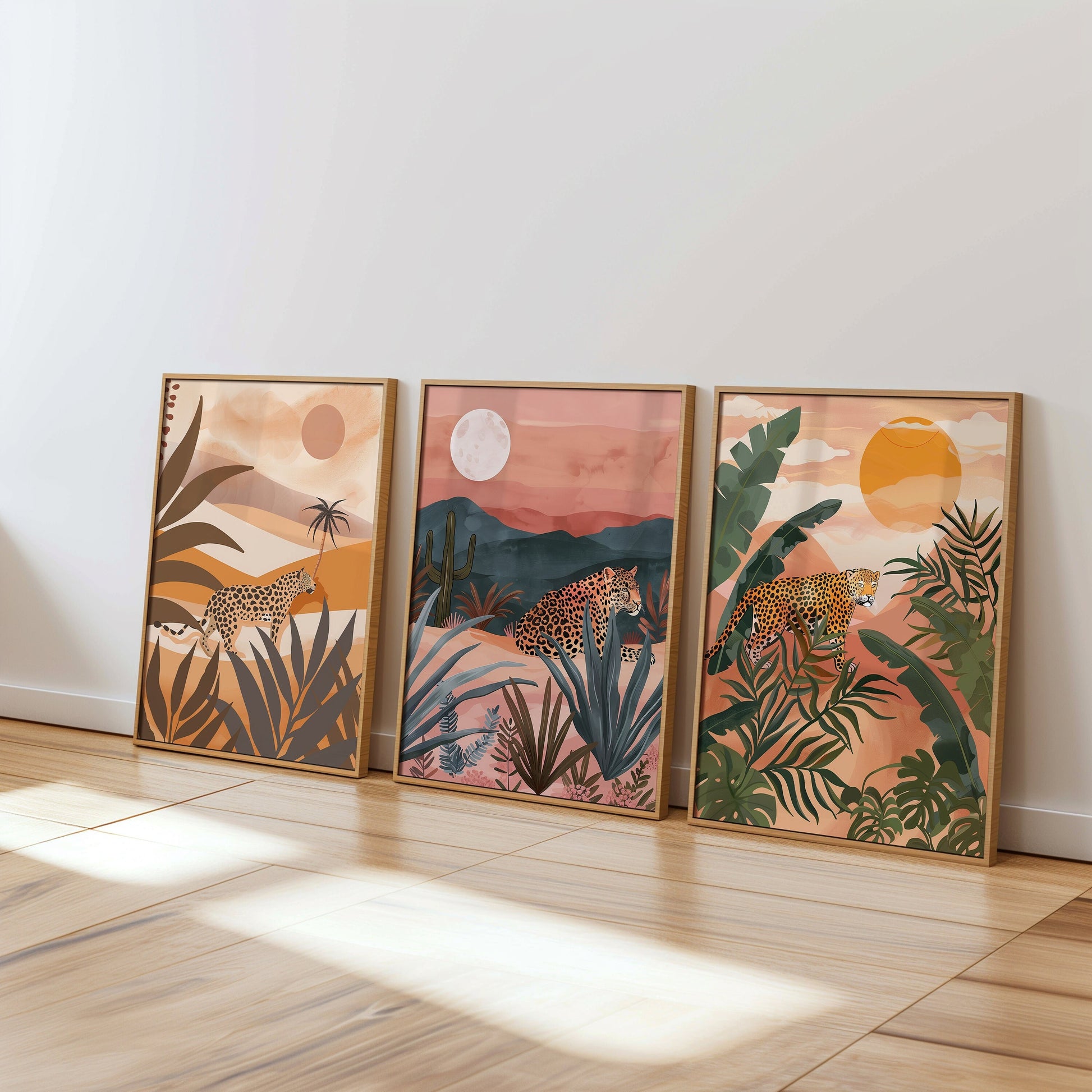 A set of three tropical posters featuring leopards in a jungle setting, in warm neutral tones, perfect for bohemian and safari-themed home decor.