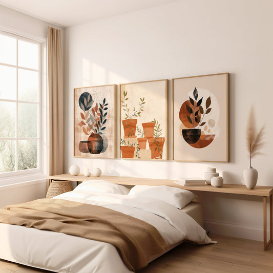 A three-piece poster set featuring minimalist plant and pot designs in warm, neutral tones, ideal for modern and bohemian home interiors.