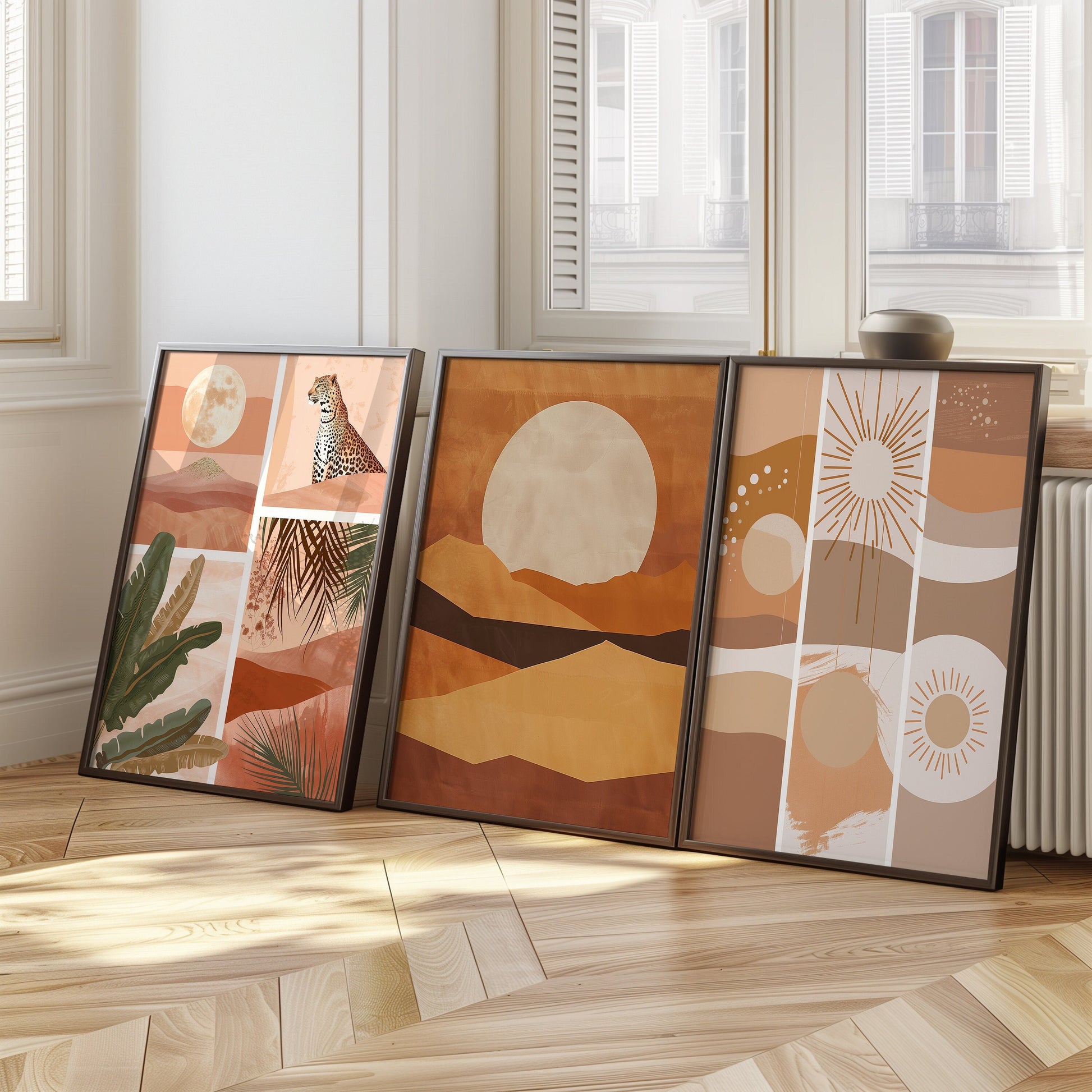 A set of three desert-themed art prints featuring a safari scene, sun, and abstract landscapes in warm, neutral tones, perfect for modern and boho-inspired home decor.