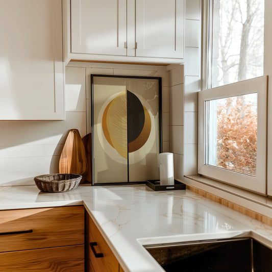 An abstract leaf poster featuring a geometric design in earth tones, placed on a window sill with a cityscape view, adding a modern touch to the space.