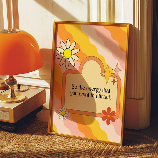 A retro-styled motivational poster with the quote &quot;Be the energy that you want to attract,&quot; featuring colorful wavy patterns and floral accents.