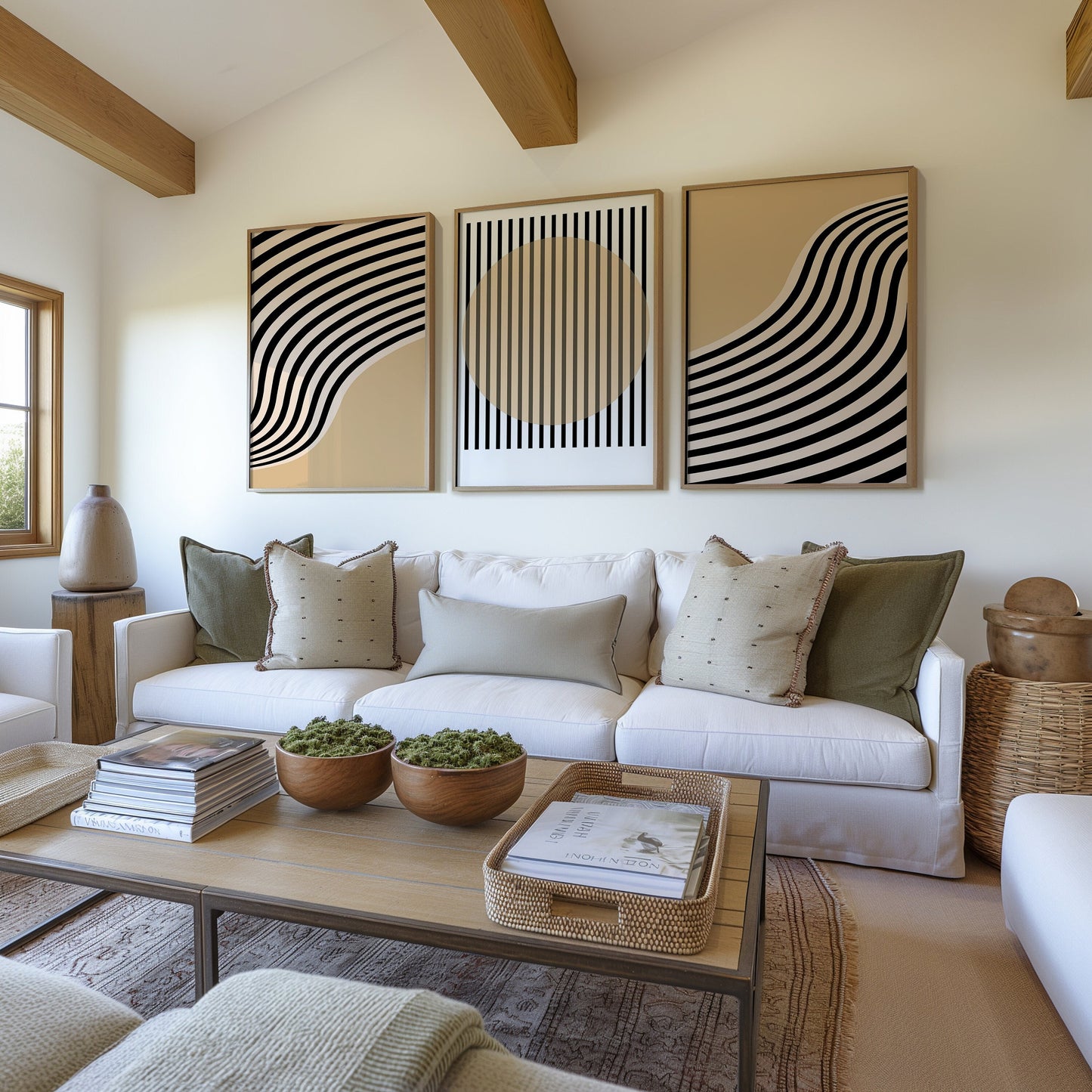 A set of three Bauhaus-inspired geometric posters in black and beige tones, featuring bold striped patterns, displayed in wooden frames on a white wall in a modern, sunlit room with wicker chairs.