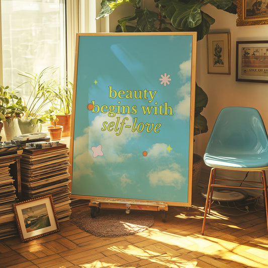 A motivational poster featuring the quote &quot;Beauty Begins With Self-Love&quot; set against a serene sky and cloud background, perfect for encouraging self-love and positivity in your space.