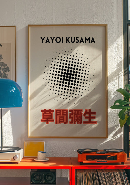 A minimalist Yayoi Kusama poster featuring a black dot gradient, inspired by her 1998 Tokyo exhibition, displayed in a modern, vibrant interior with red and black accents.