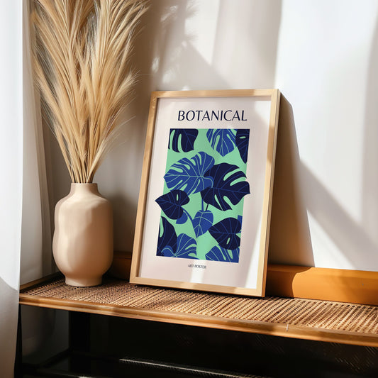 A botanical art poster featuring bold green and blue monstera leaves, perfect for adding a touch of tropical nature to any room.