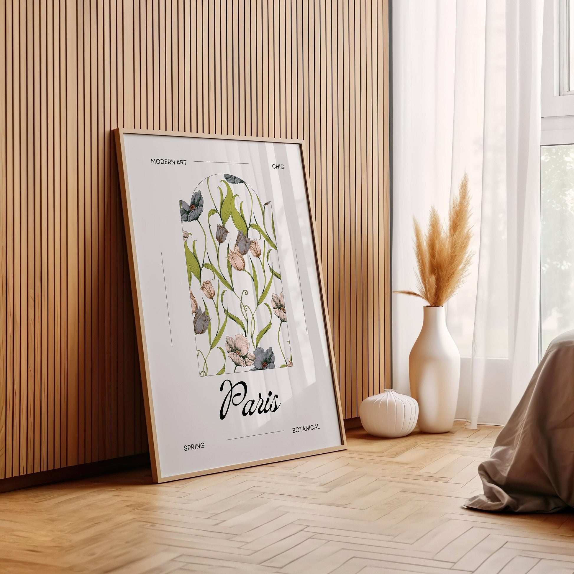 A framed botanical art print titled &quot;Paris&quot; featuring an elegant floral illustration within an arch, showcasing spring flowers in soft green and beige tones, perfect for adding a touch of French country style to any space.