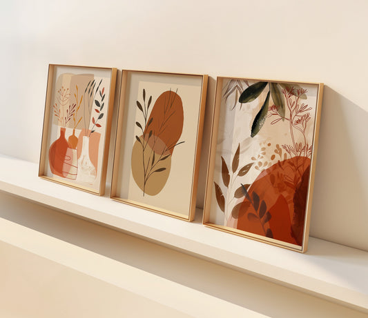 A three-piece poster set featuring abstract botanical designs with vases and plant motifs in warm earthy tones, perfect for modern and bohemian home decor.