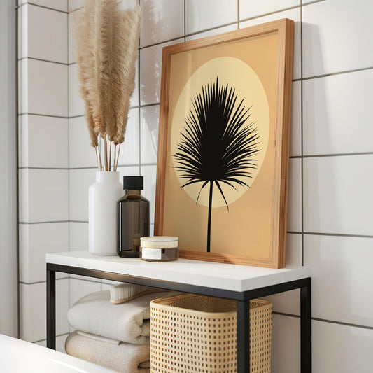 A stylish minimalist poster featuring a black palm leaf against a beige background, perfect for adding a tropical touch to bathroom decor.