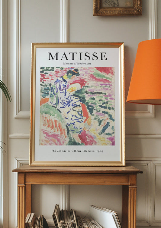 A colorful &quot;La Japonaise&quot; poster by Henri Matisse, featuring abstract brushstrokes and vibrant colors, showcased in a vintage frame.