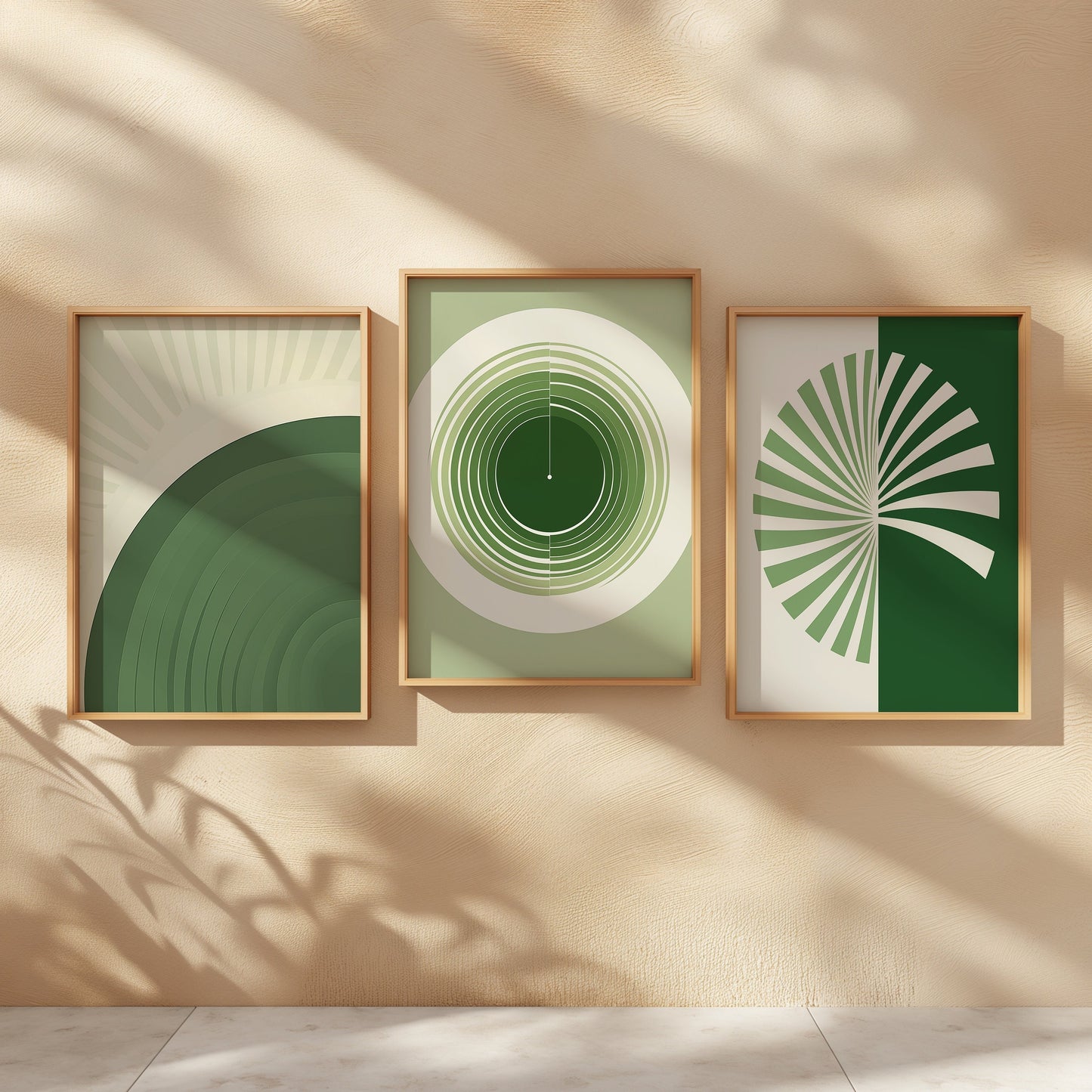 A set of three minimalist geometric wall art prints in shades of green and white, featuring abstract circular and fan shapes, perfect for modern and contemporary interiors.