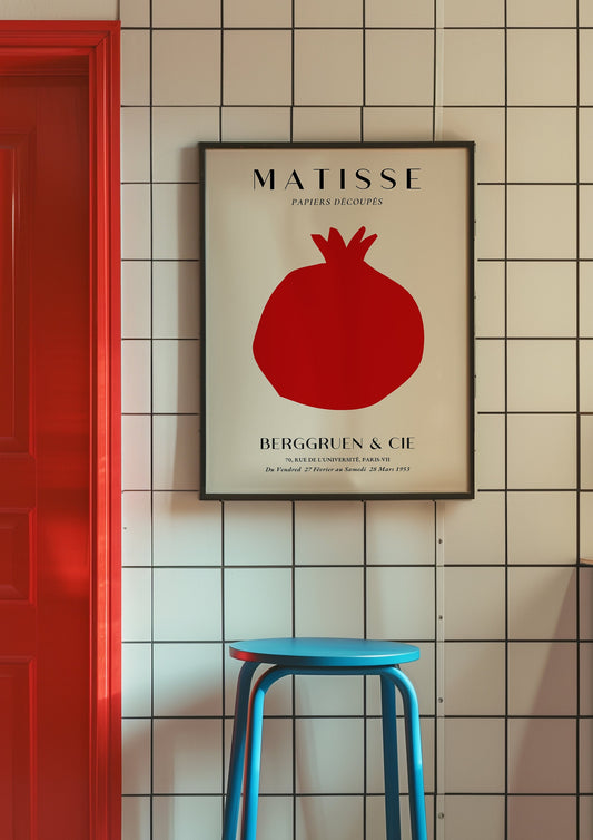 A minimalist art print featuring a bold red pomegranate, inspired by Matisse&#39;s style. Perfect for kitchen or living room decor.