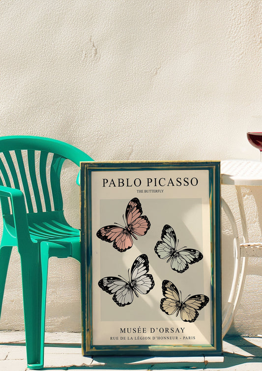 A delicate Picasso butterfly poster featuring soft pastel butterflies in black outlines on a muted background, with &quot;Musee D&#39;Orsay&quot; text below, perfect for adding a touch of nature and vintage style to your decor.