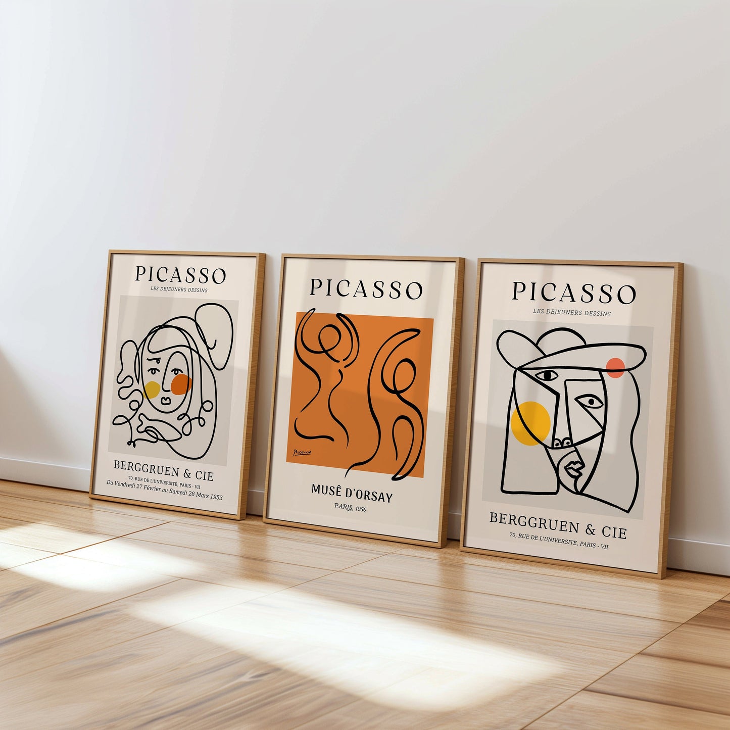 A set of three Picasso-inspired posters, featuring minimalist line art and abstract shapes in a combination of black, orange, and white tones. Each print celebrates Picasso&#39;s unique style.