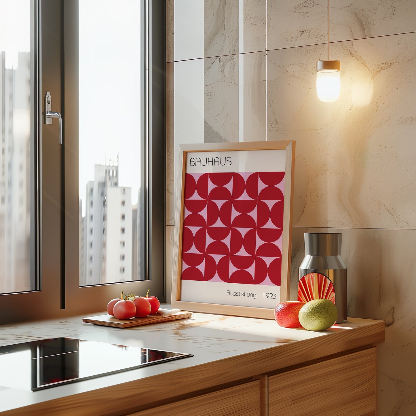 A Bauhaus Ausstellung 1923 poster featuring a red geometric pattern, displayed in a modern kitchen. The poster adds a touch of minimalist, abstract design to the sleek and contemporary kitchen environment.