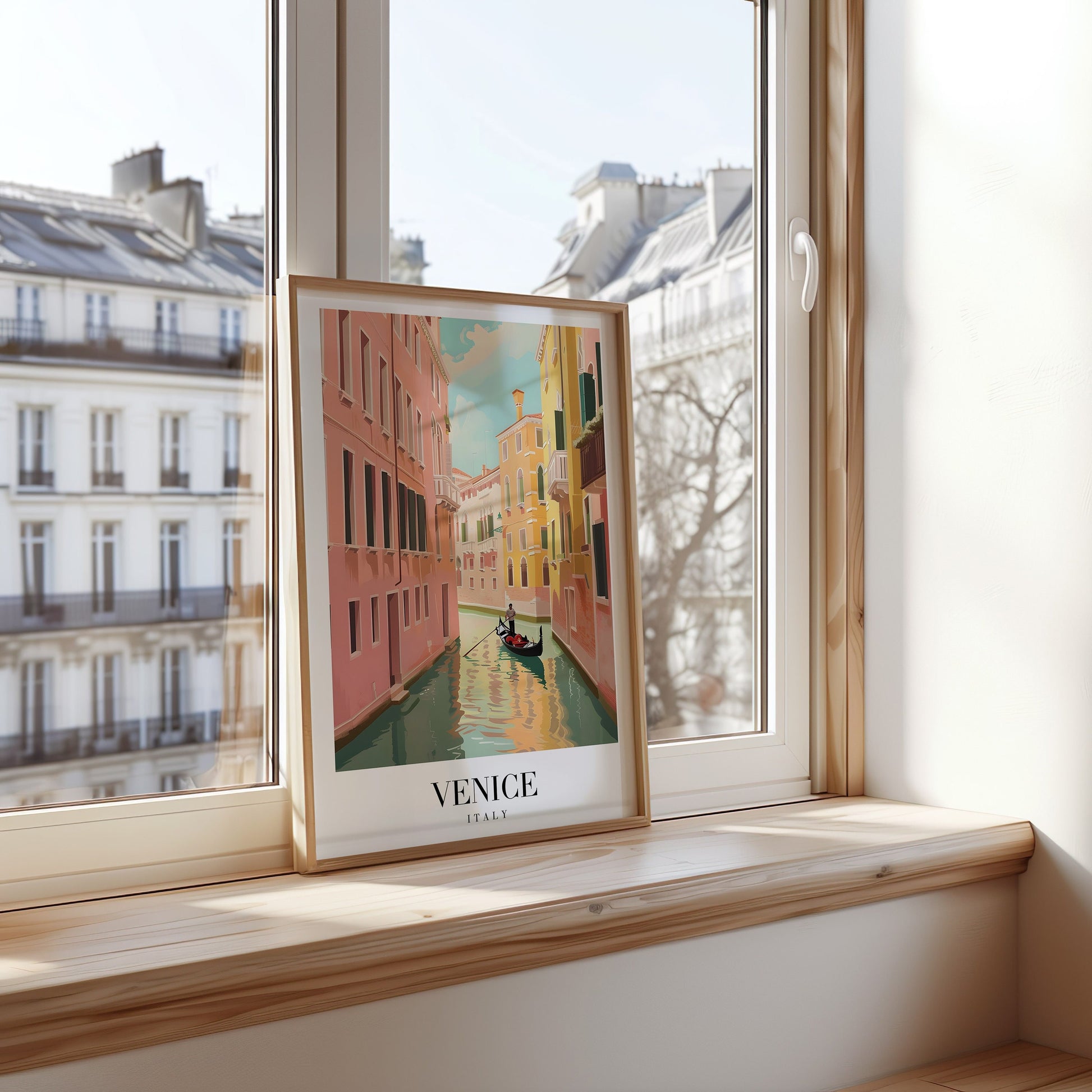 A framed poster showcasing the picturesque Venetian canals, with a gondola gliding through the narrow waterways under a pastel sky.