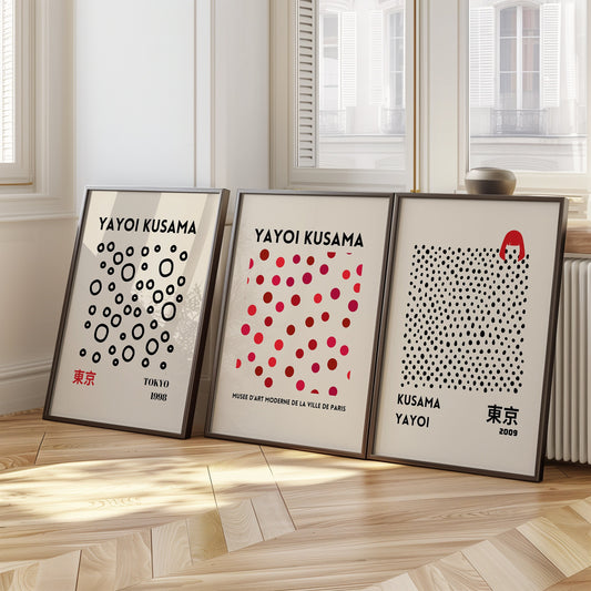 Set of three Yayoi Kusama posters featuring black, red, and pink polka dots inspired by Tokyo 1998 and 2009 exhibitions, minimalist modern abstract art.