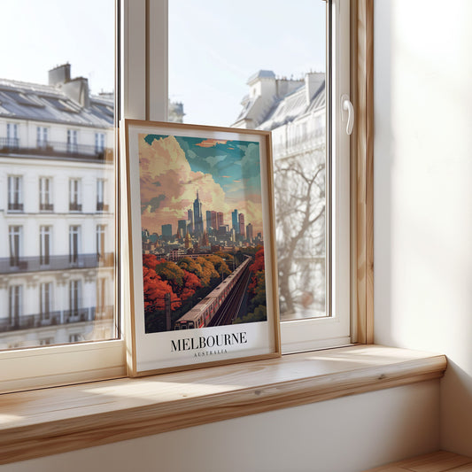 A vibrant poster of Melbourne, Australia, showcasing the city skyline during autumn with a train passing through a tree-lined track, capturing the urban charm and natural beauty.