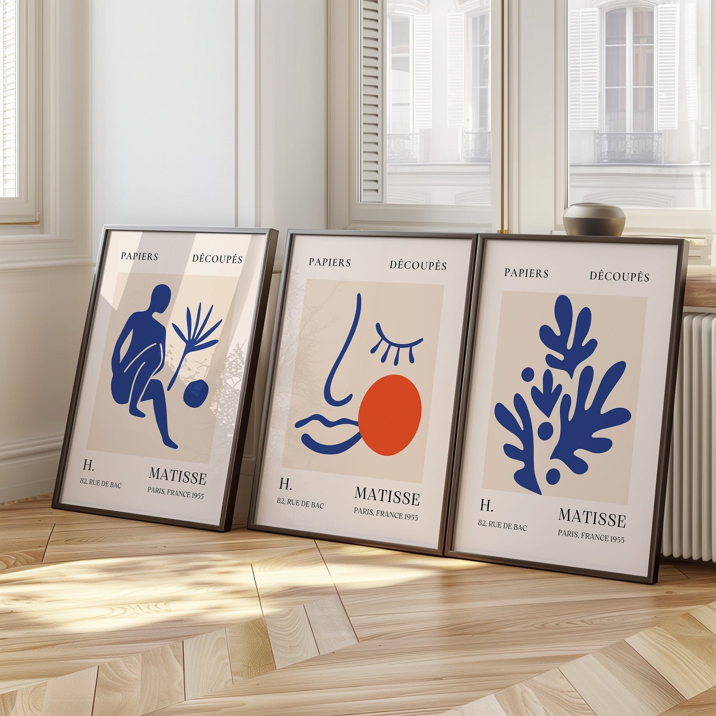 A trio of Henri Matisse posters featuring blue abstract cut-out designs, a minimalist face print, and abstract shapes, part of the Papiers Découpés collection, perfect for modern decor.