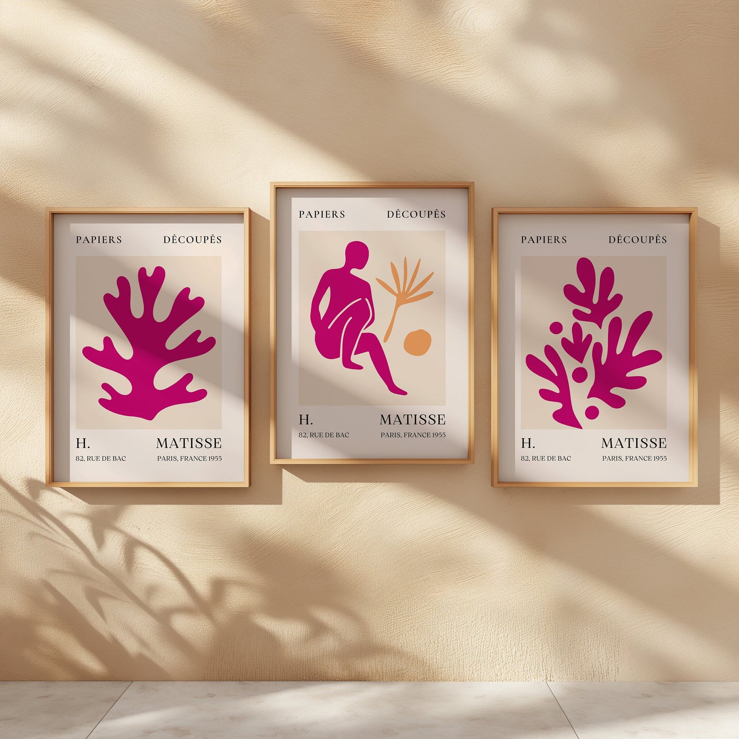 A trio of Henri Matisse posters featuring pink and orange abstract cut-out designs from the Papiers Découpés collection, perfect for modern minimalist decor.