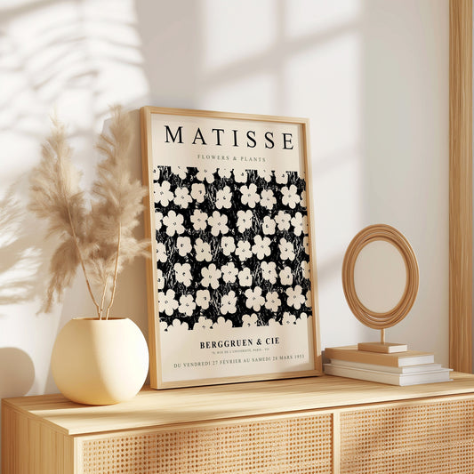 A black-and-white Henri Matisse poster featuring abstract floral designs from the &quot;Flowers & Plants&quot; series, perfect for modern and minimalist home decor.