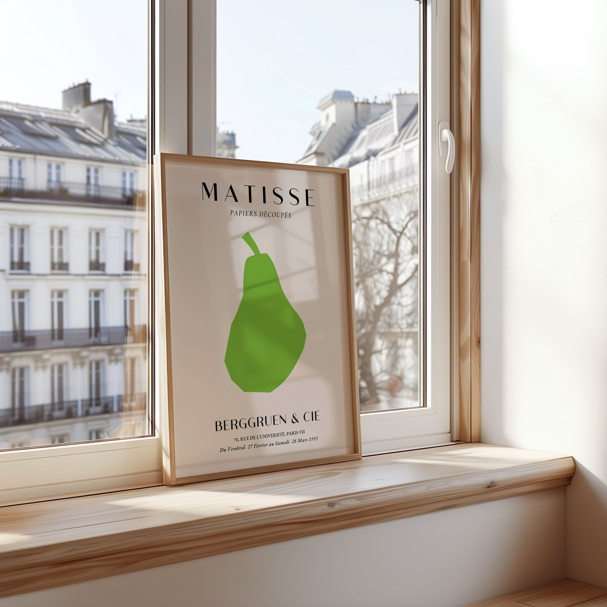 A minimalist green pear art print inspired by Matisse&#39;s cut-out style, ideal for modern and Scandinavian kitchen decor.