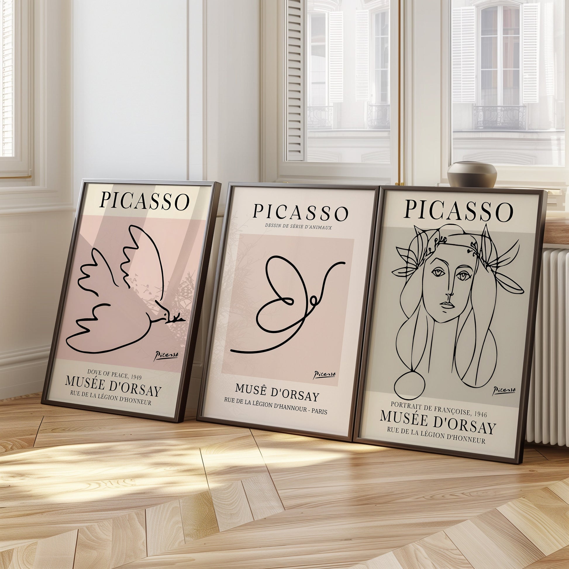 A set of three minimalist Picasso-inspired posters, featuring the Dove of Peace, a portrait of Françoise, and an abstract animal line drawing, all in black and white.