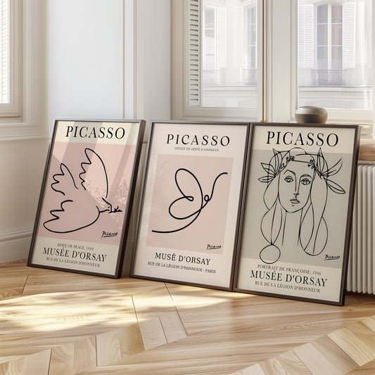 A set of three minimalist Picasso-inspired posters, featuring the Dove of Peace, a portrait of Françoise, and an abstract animal line drawing, all in black and white.