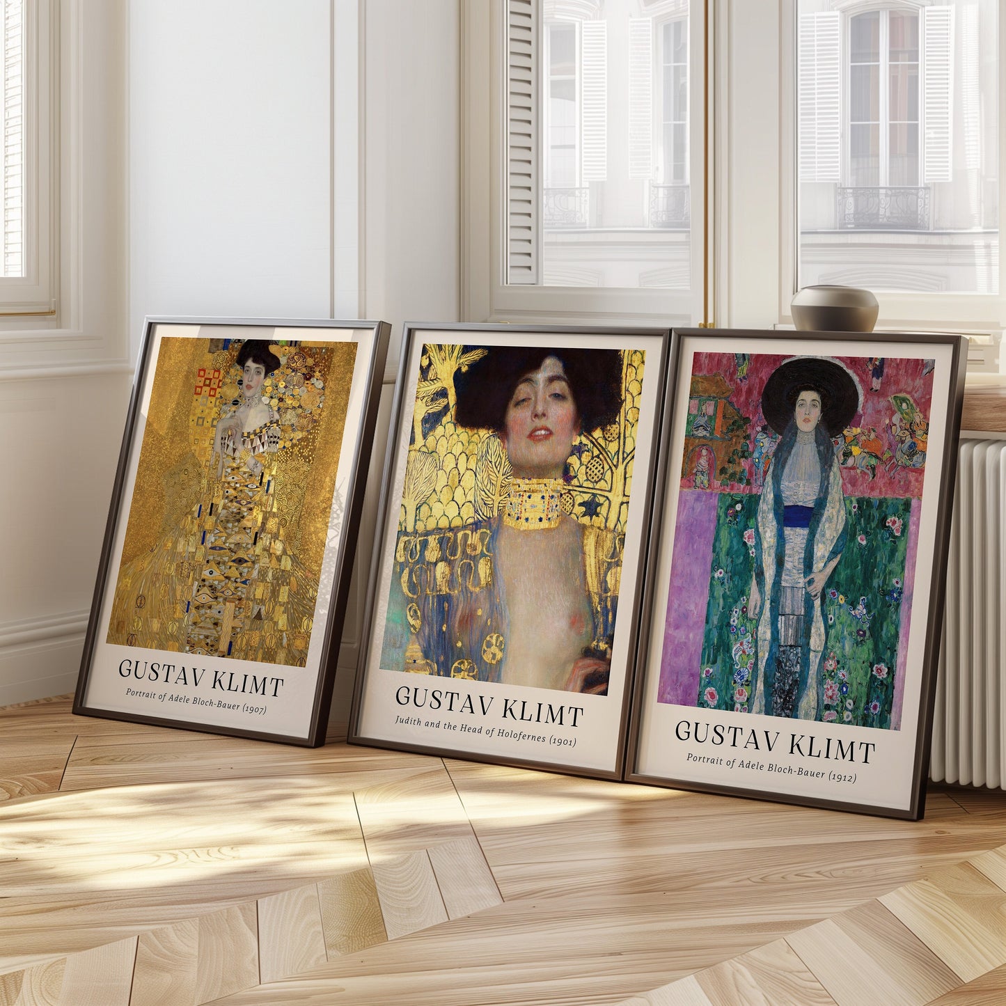 A set of three Gustav Klimt posters featuring Portrait of Adele Bloch-Bauer 1912, Judith and the Head of Holofernes 1901, and Portrait of Adele Bloch-Bauer 1907, perfect for lovers of Art Nouveau.