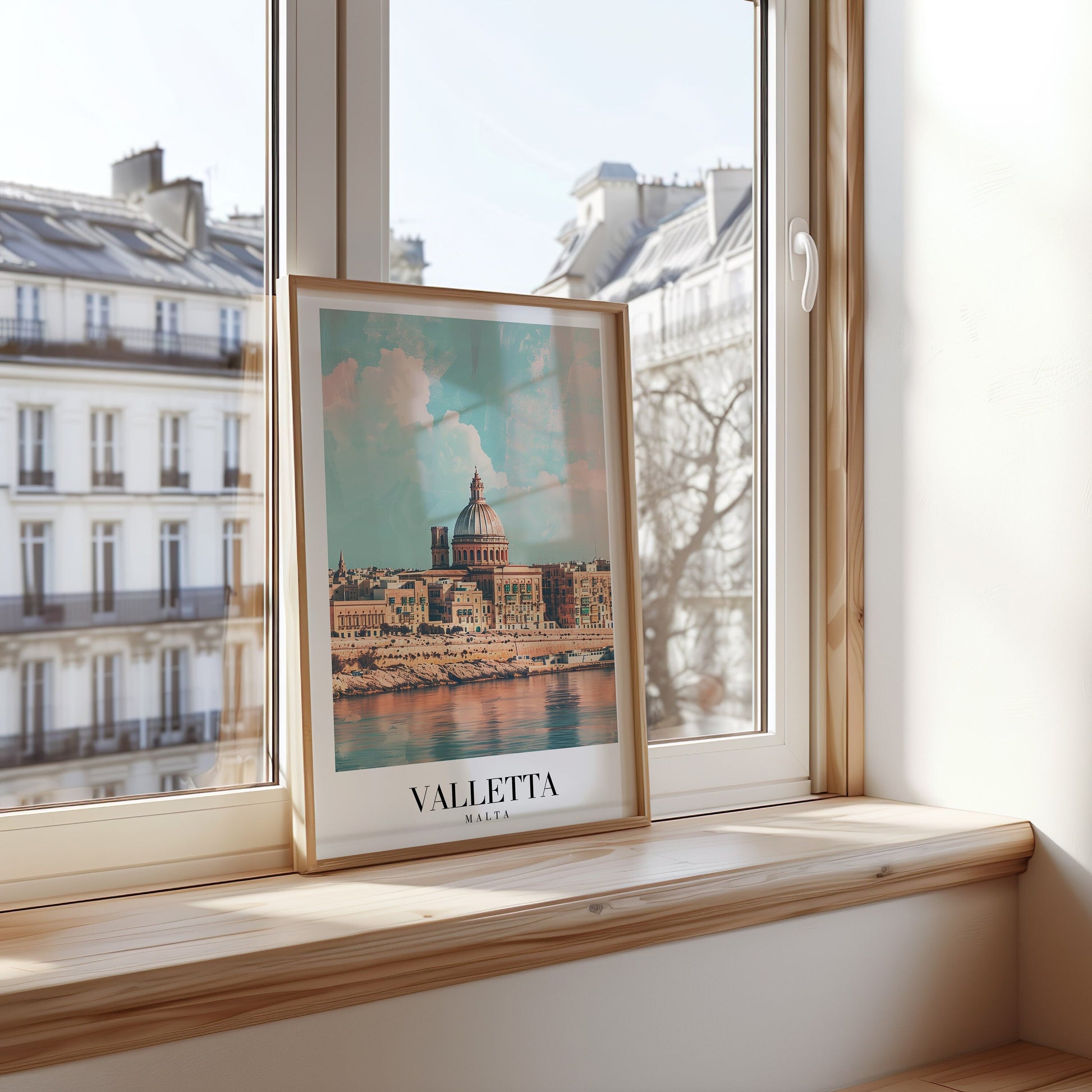 A framed poster showcasing the historic cityscape of Valletta, Malta, with its iconic dome and waterfront, bathed in warm Mediterranean light.