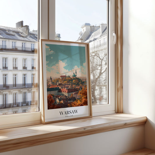 A framed poster depicting the picturesque Old Town of Warsaw, with its iconic rooftops and historical architecture, under a vibrant blue sky.