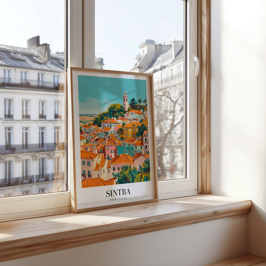 A vibrant poster of Sintra, Portugal, featuring colorful houses nestled on the hillside with a tower rising in the background, capturing the charm of this historic city.