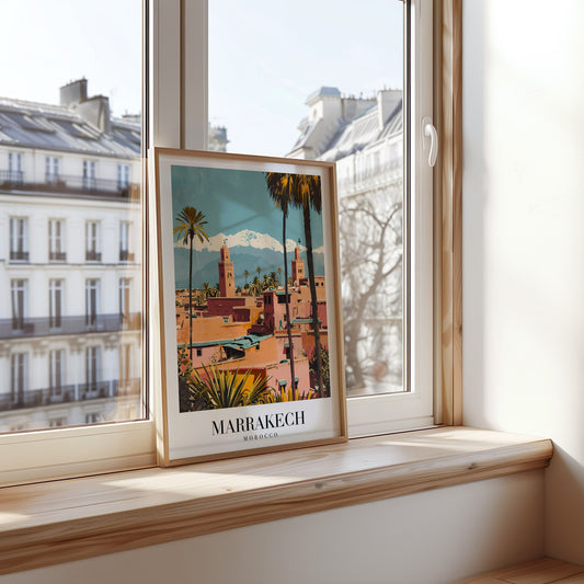 A vibrant poster of Marrakech, Morocco, featuring the city&#39;s iconic pink buildings, palm trees, and the Atlas Mountains in the background, capturing the essence of this exotic city.