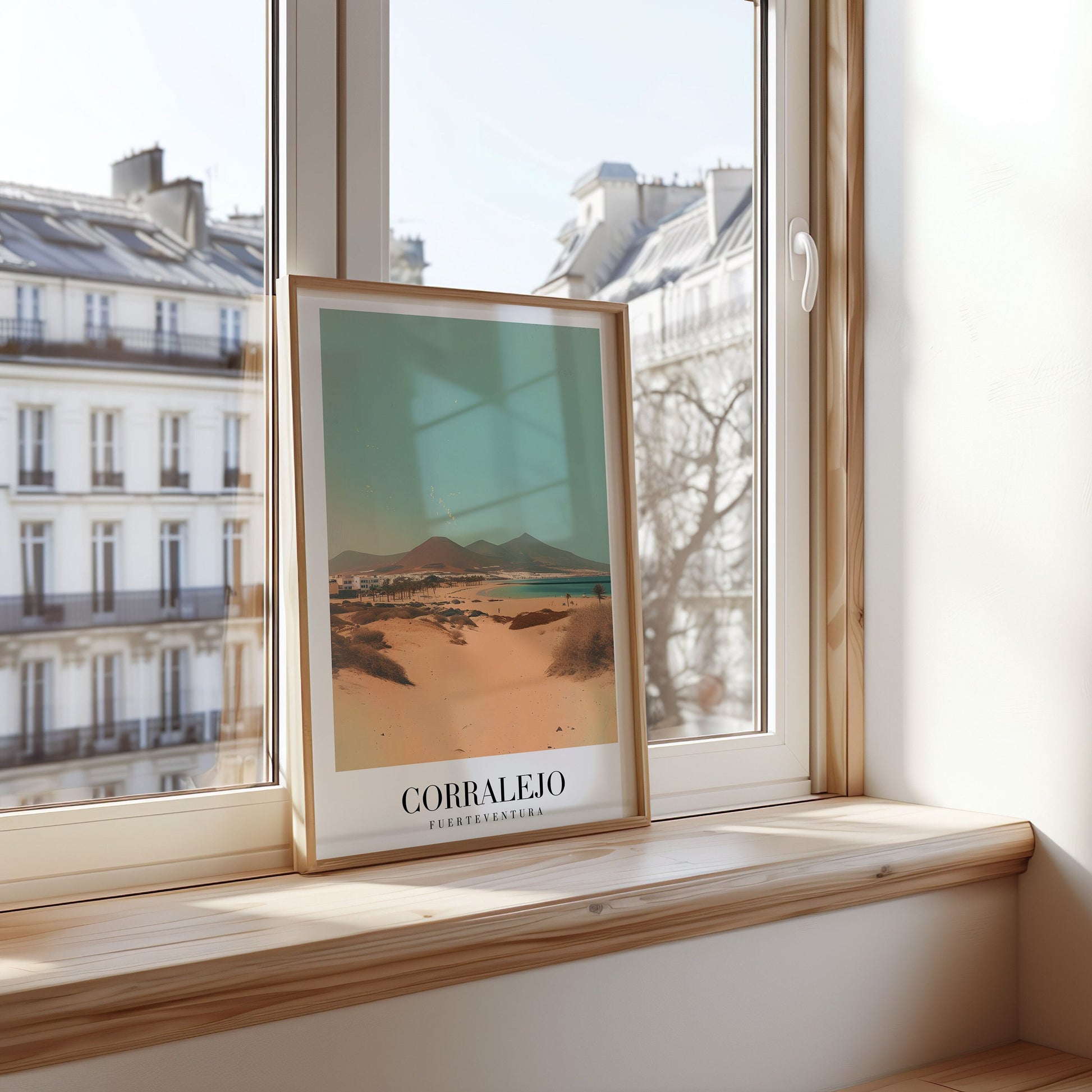 A scenic poster of Corralejo, Fuerteventura, depicting the sandy dunes with distant mountains and a clear sky.